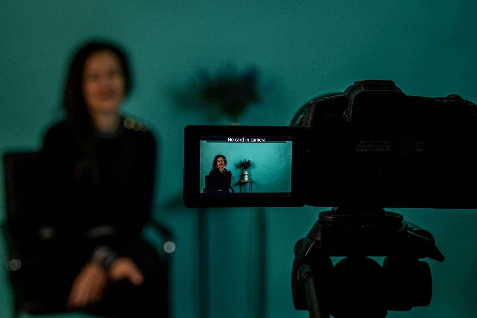 Filming a video with the camera in focus.